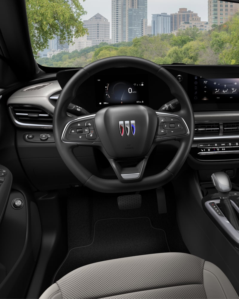 Close-up of the Buick Envista Avenir Interior Drivers Side View of the Steering Wheel and Dashboard