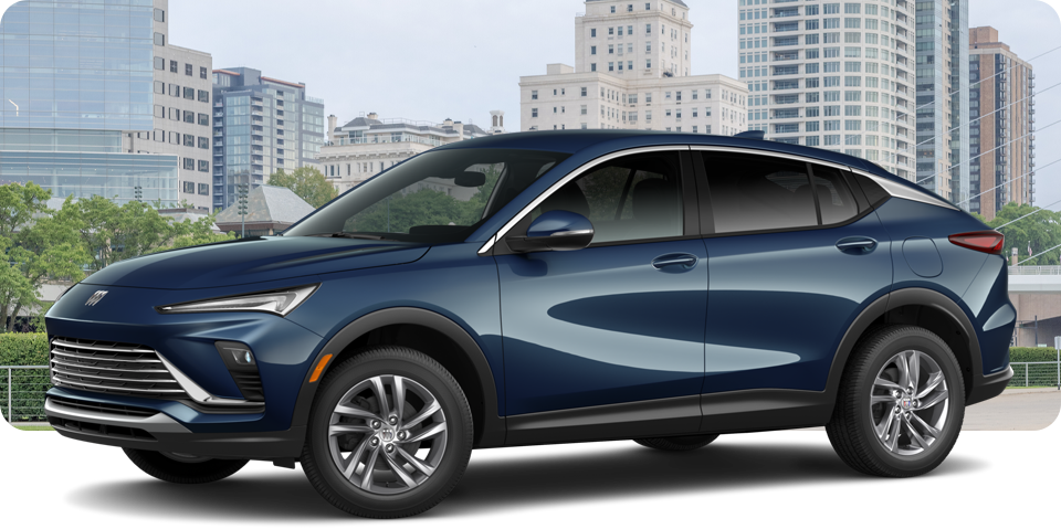 Front-Three Quarter View of a White Buick Envista Compact SUV Parked in Front of a City