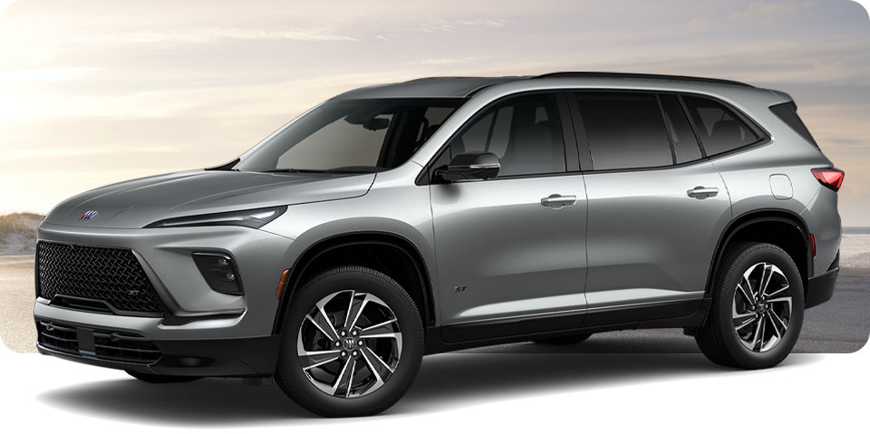 Front-Three Quarter View of a Silver Buick Enclave ST Sport SUV Parked Near a Beach